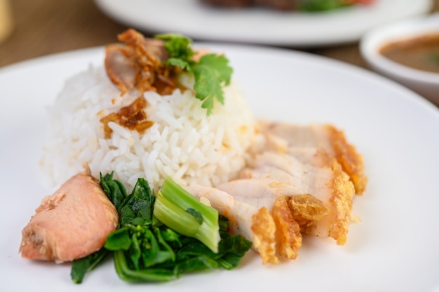 Crispy pork on a white plate.