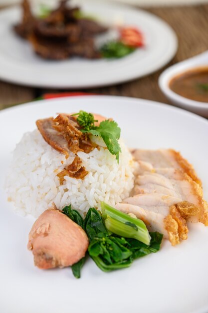 Crispy pork on a white plate.