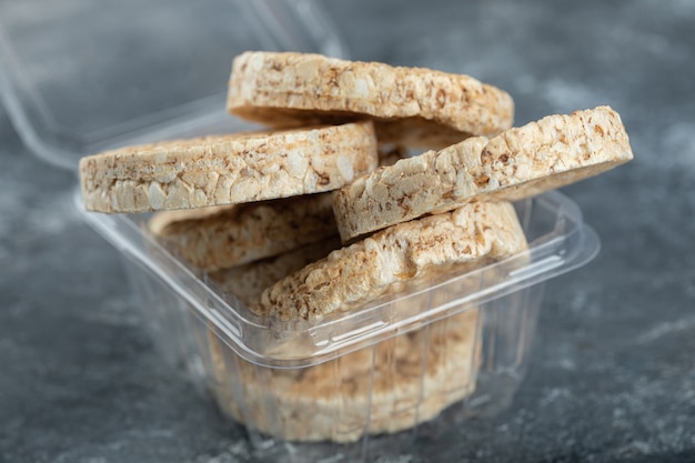 Crispy rice cakes in plastic container