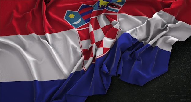 Free photo croatia flag wrinkled on dark background 3d render