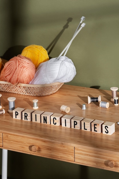 Crocheting yarn on desk high angle