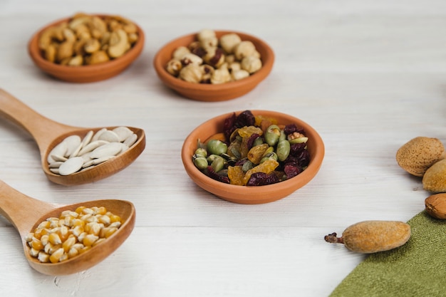 Crockery with seeds, beans and nuts