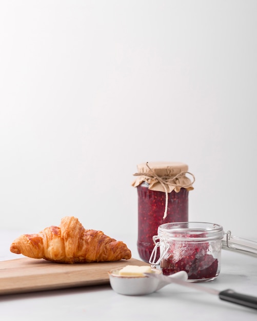 Croissant and homemade wild berry jam