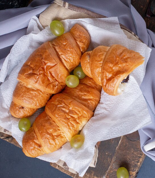 Croissants with green grapes