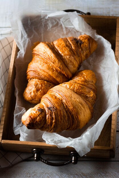 Croissants in wooden box