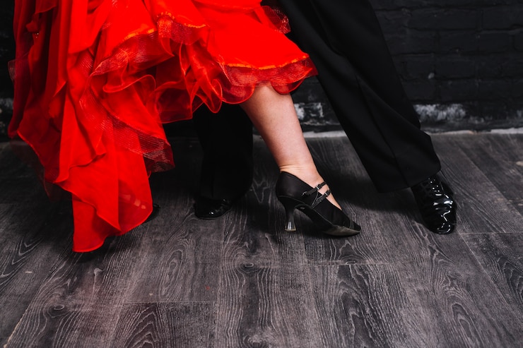 Free Photo crop couple dancing on gray parquet