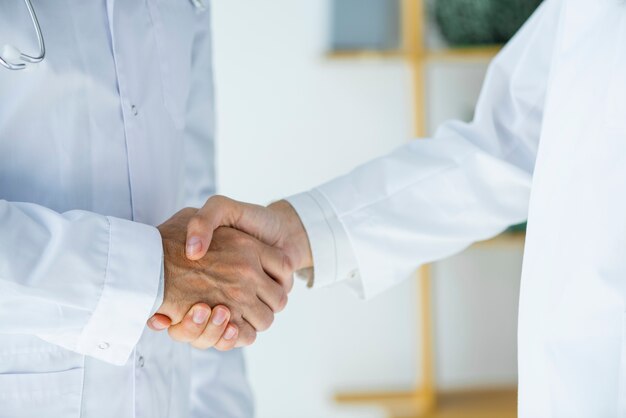 Crop doctors shaking hands