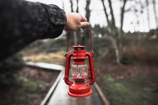 Crop hand with lantern