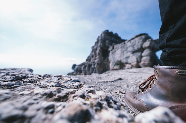 Free photo crop leg on rock