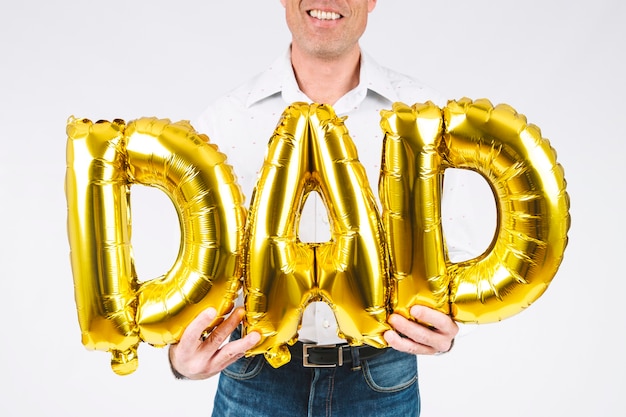 Crop man with dad writing