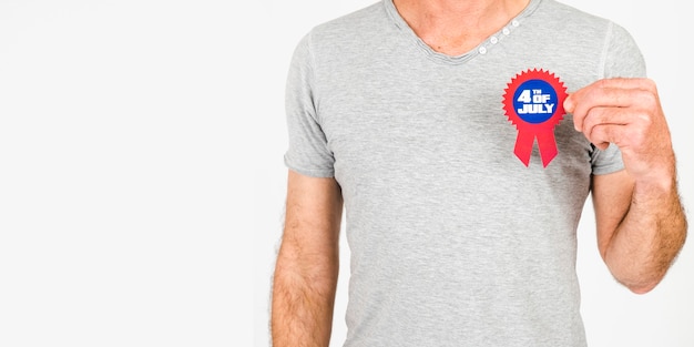 Free photo crop man with small independence day badge