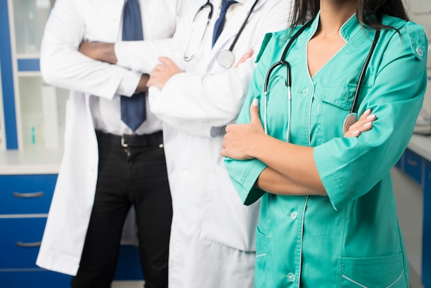 Crop medics with arms crossed