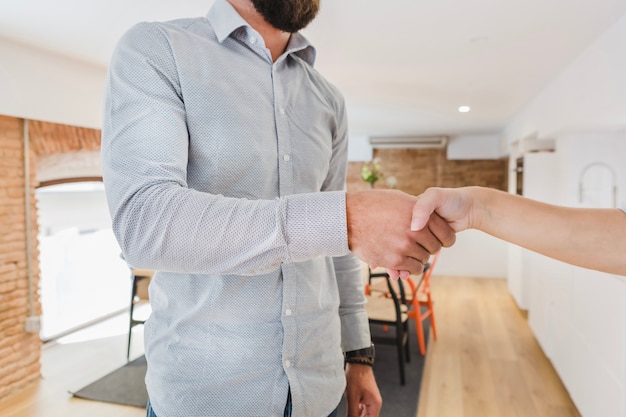 Free photo crop people shaking hands