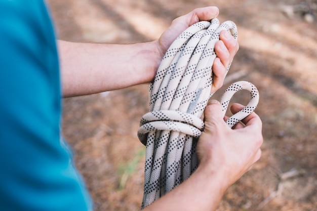 Crop person with rope