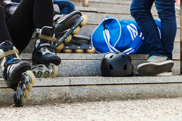 Crop skates sitting on steps