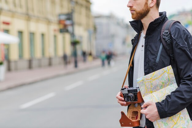 Crop tourist on street