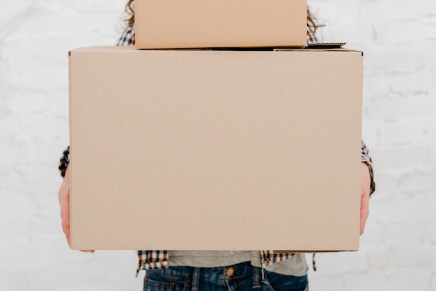 Free photo crop woman with carton boxes