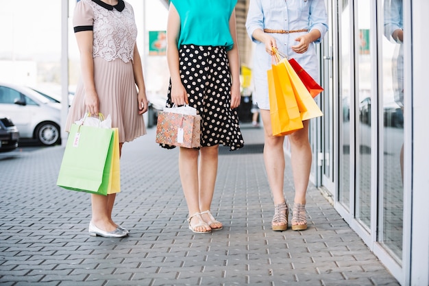 Crop women shoppers