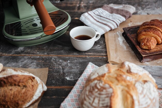 Cropped image of a lot of bread on table