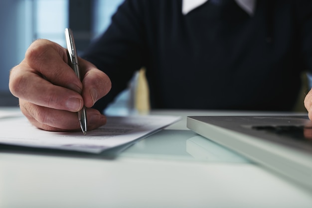 Cropped unrecognizable man checking contract