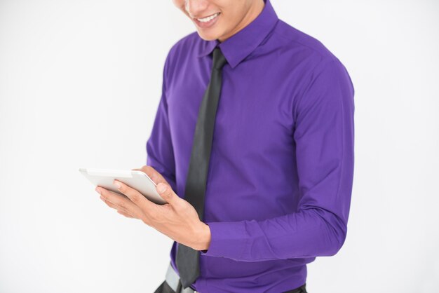 Cropped View of Business Man Using Tablet