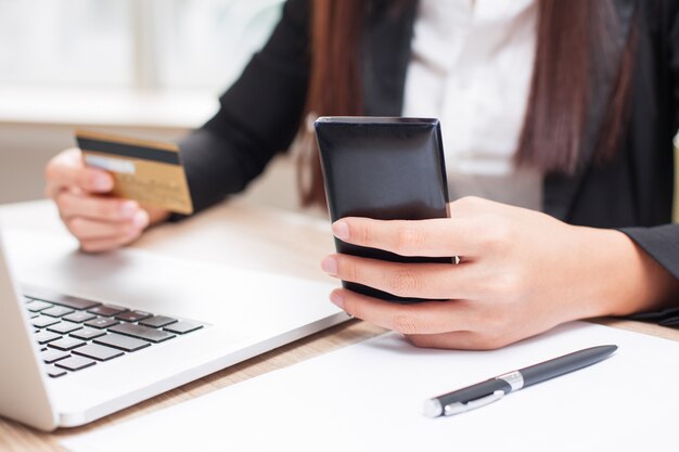 Cropped View of Businesswoman Doing Online Banking