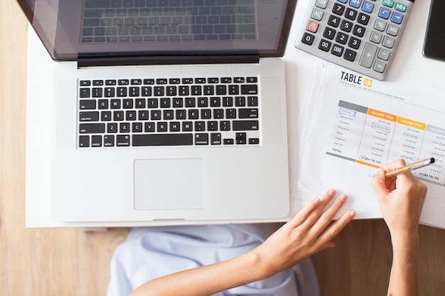 Cropped View of Woman Working With Document