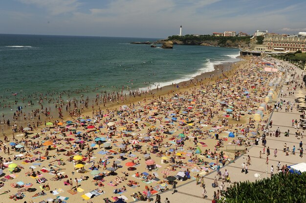 Crowded beach in summer season, aerial view