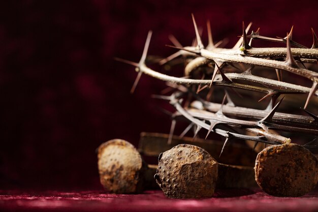 Crown of thorns and rusty nails arrangement