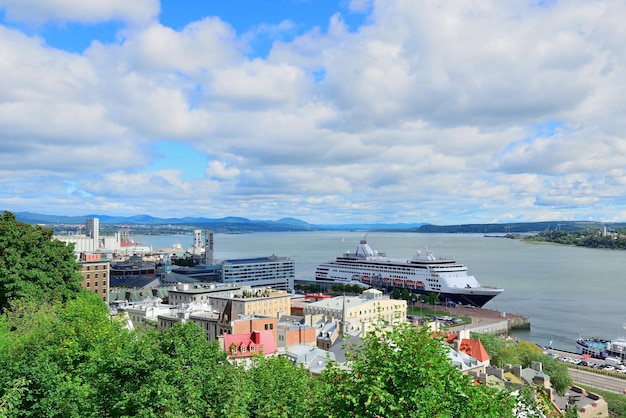 Cruise ship and lower town old buildings with blue sky in Quebec City.