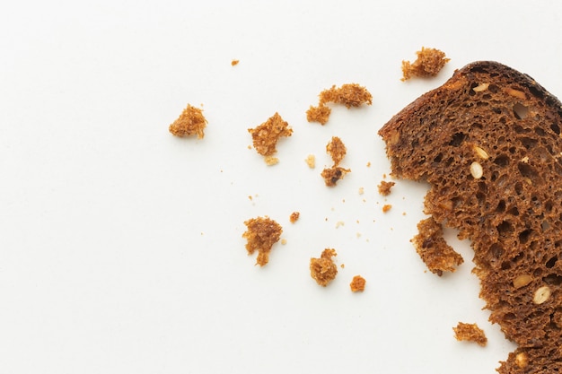 Free photo crumbs of bread leftover food waste