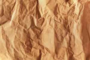 Free photo crumped brown paper