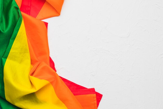 Crumpled multicolored cloth on white background