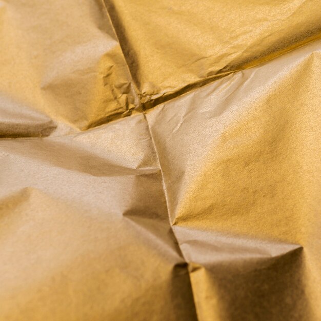 Crumpled squared of gold foil