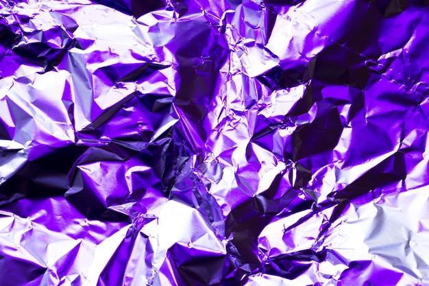 無料写真 しわくちゃの鮮やかな紫のアルミホイルの背景