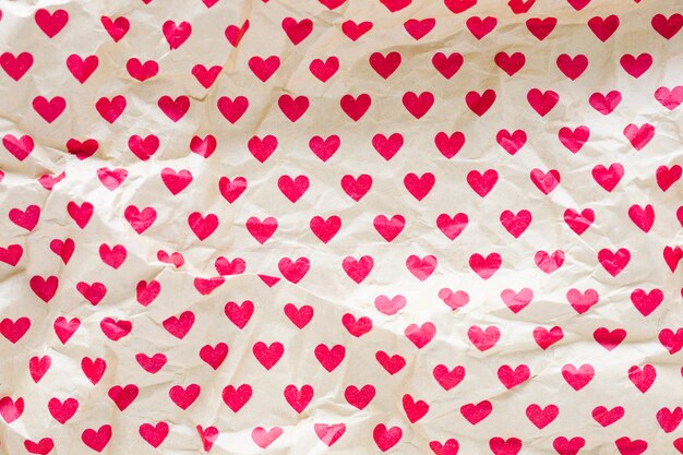 Crumpled wrapping paper with hearts