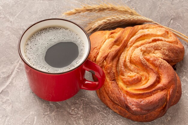 Crunchy bagel and coffee close up