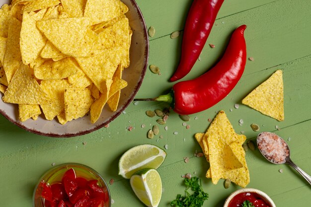 Crunchy chips and vegetables on plates