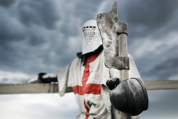 Crusader in armor holding axe