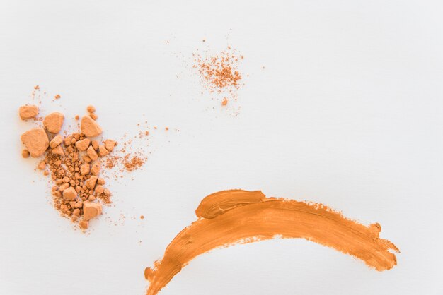 Crush compact powder on white background