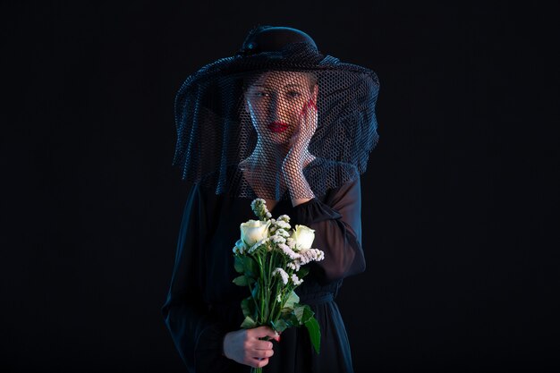 Crying Female Dressed In All Black With Flowers On Black  Death Sadness Funeral