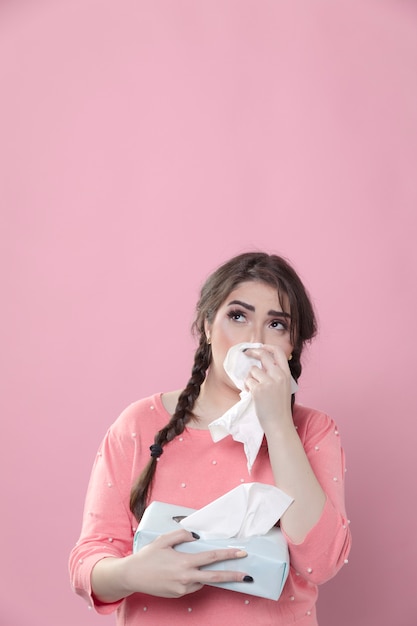 Free photo crying woman using napkins