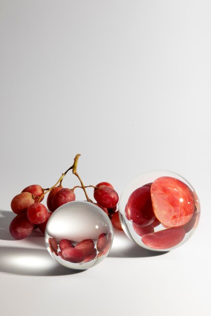 Crystal balls and fruits still life