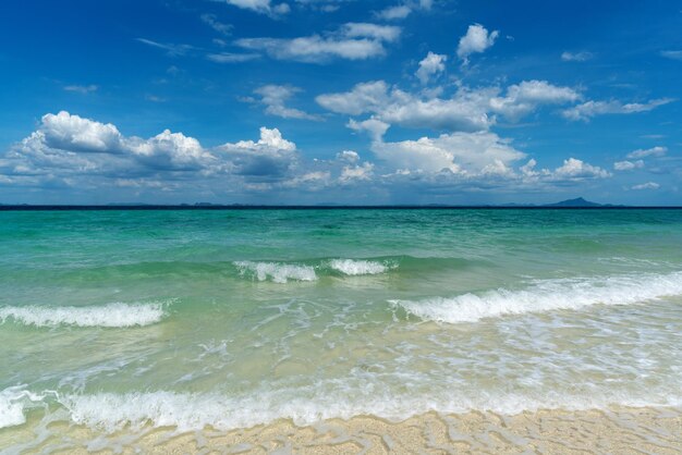 Crystal sea and blue sky background. Tropical beach.