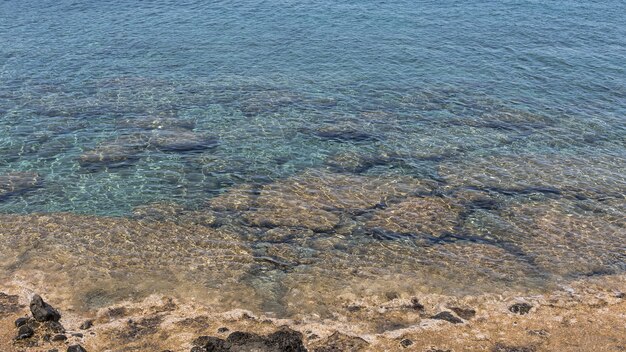 Crystalline ocean water in daylight