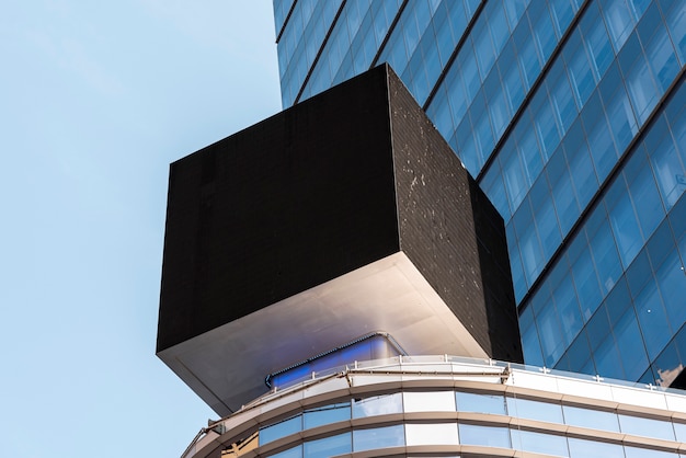 Cubic mock-up billboard in city scape