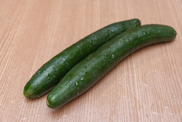 Cucumbers on wooden table