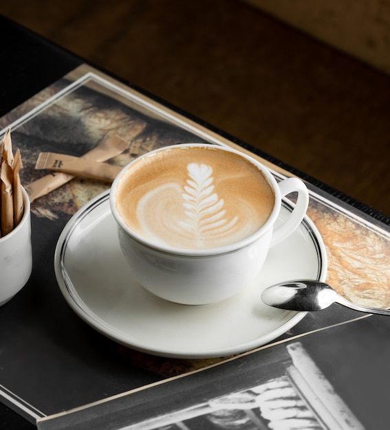 Cup of cappuccino with rosetta latte art