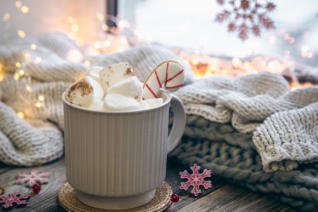 Free Photo | A cup of cocoa with marshmallows closeup on a blurred ...