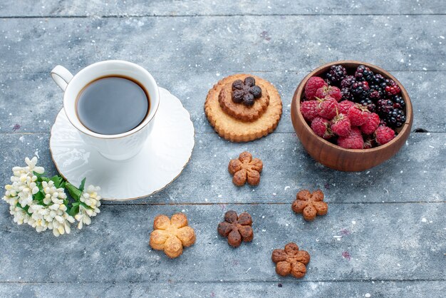 cup of coffee along with little cookies and berries on grey wooden, sweet sugar bake pastry cookie biscuit